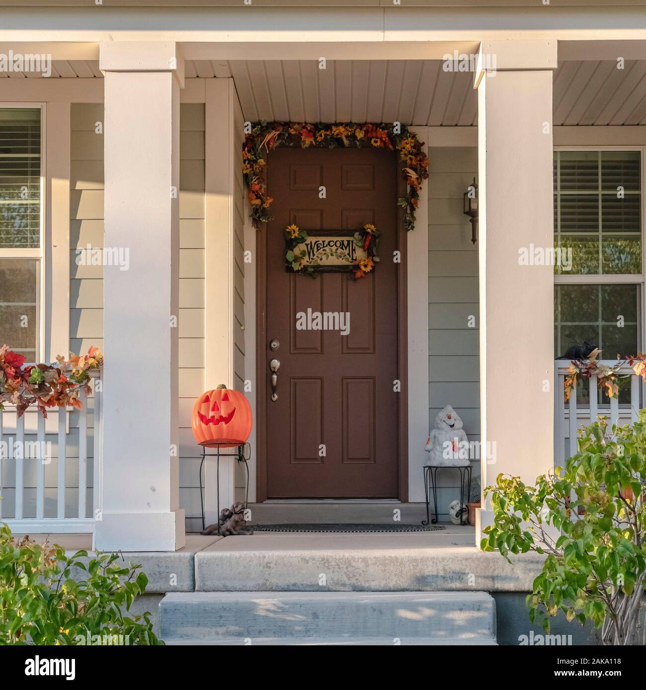 Square Concrete walkway and steps leading to a house Stock Photo - Alamy