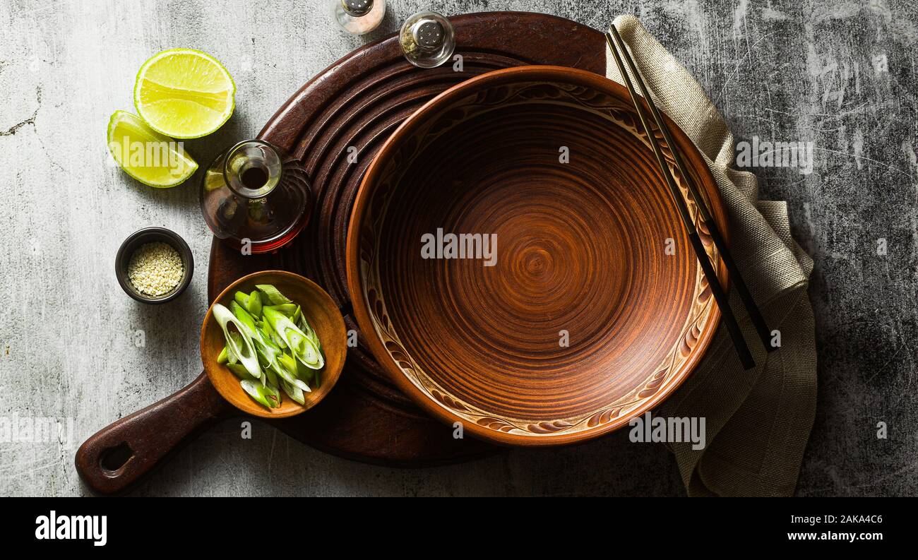 Banner Of Empty Clay Dishes Serving Set On The Table Stock Photo
