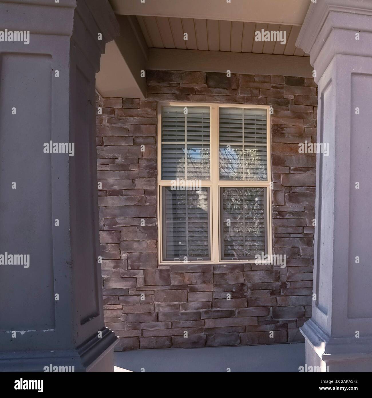 Square Decorative large pillars on an entrance porch Stock Photo Alamy