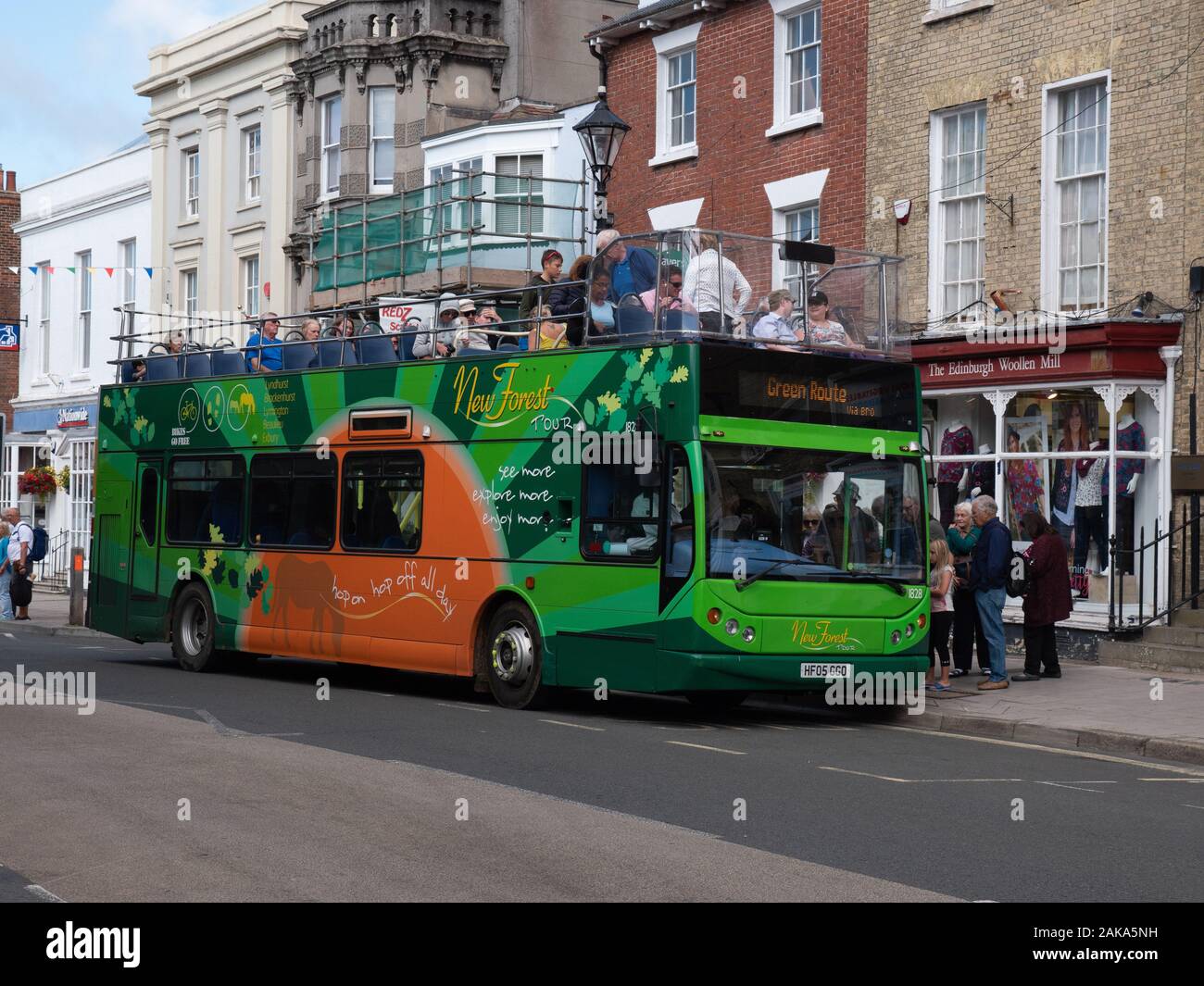 An East Lancs Myllenium Vyking bodied Volvo B7TL open top bus loads passengers in Lymington for the New Forest tour Stock Photo