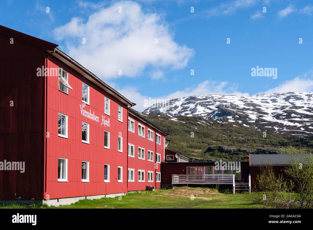 Red wooden Vatnahelsen hotel mountain resort located on Flam railway route in summer. Vatnahelsen, Aurland, Norway, Scandinavia Stock Photo