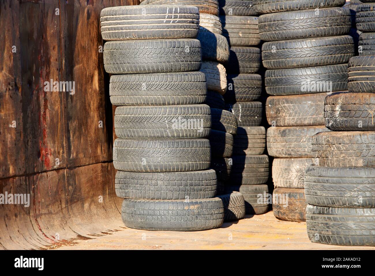 Stacks of old used car tires in recycle centre Stock Photo Alamy