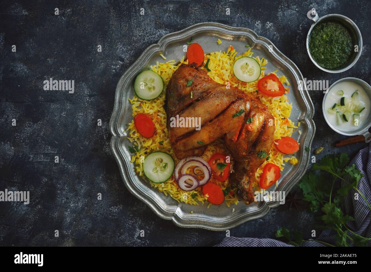 Chicken Kabsa/ kuzhi Mandhi or Mandi Biryani served with yogurt mint