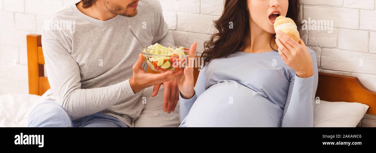 Junk food during pregnancy concept. Pregnant woman rejecting fresh ... Junk food during pregnancy concept. Pregnant woman rejecting fresh ...