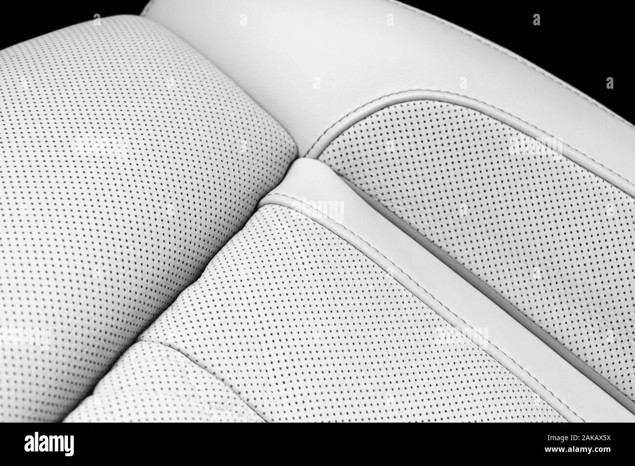 Modern luxury Car white leather interior. Part of perforated leather