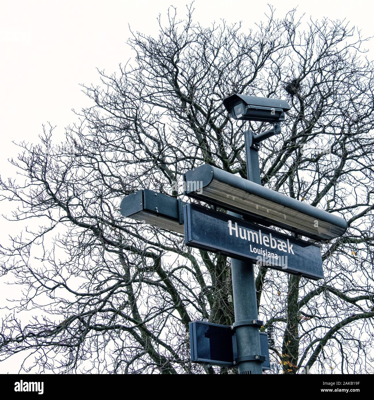 CCTV security camera & sign at Humlebæk railway station in Humlebæk,North Zealand, Denmark Stock Photo