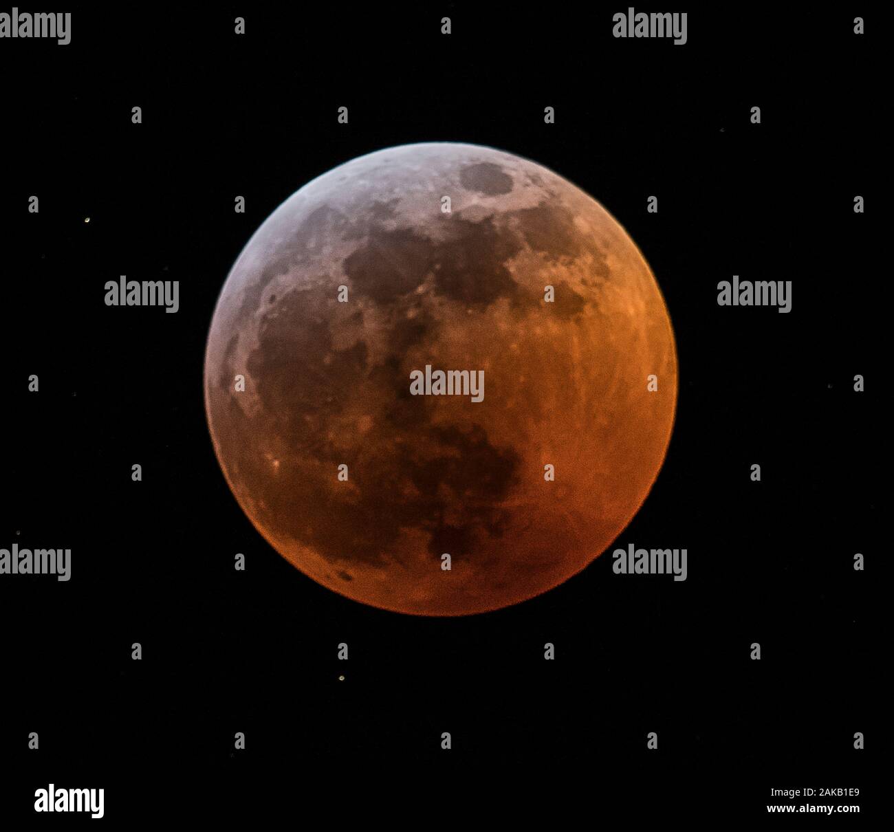 Full moon against black sky Stock Photo