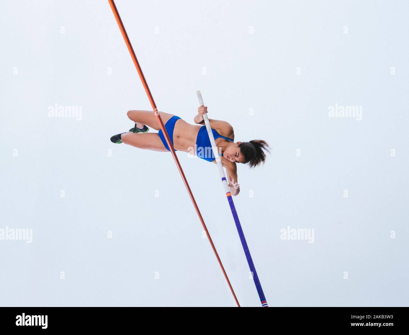 View of young woman pole jumper Stock Photo