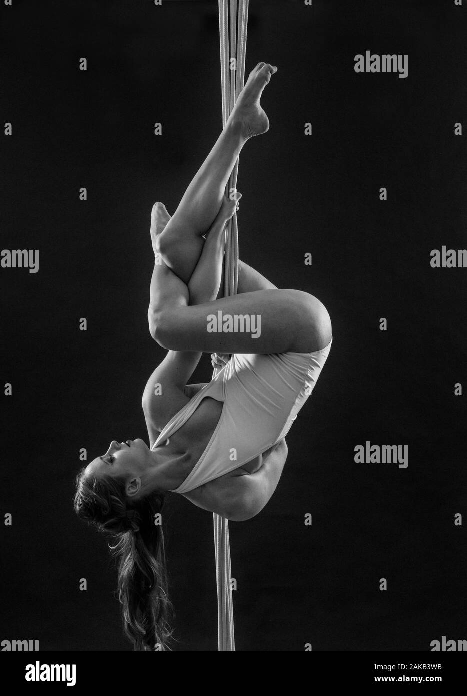 View of woman acrobat in bodysuit Stock Photo