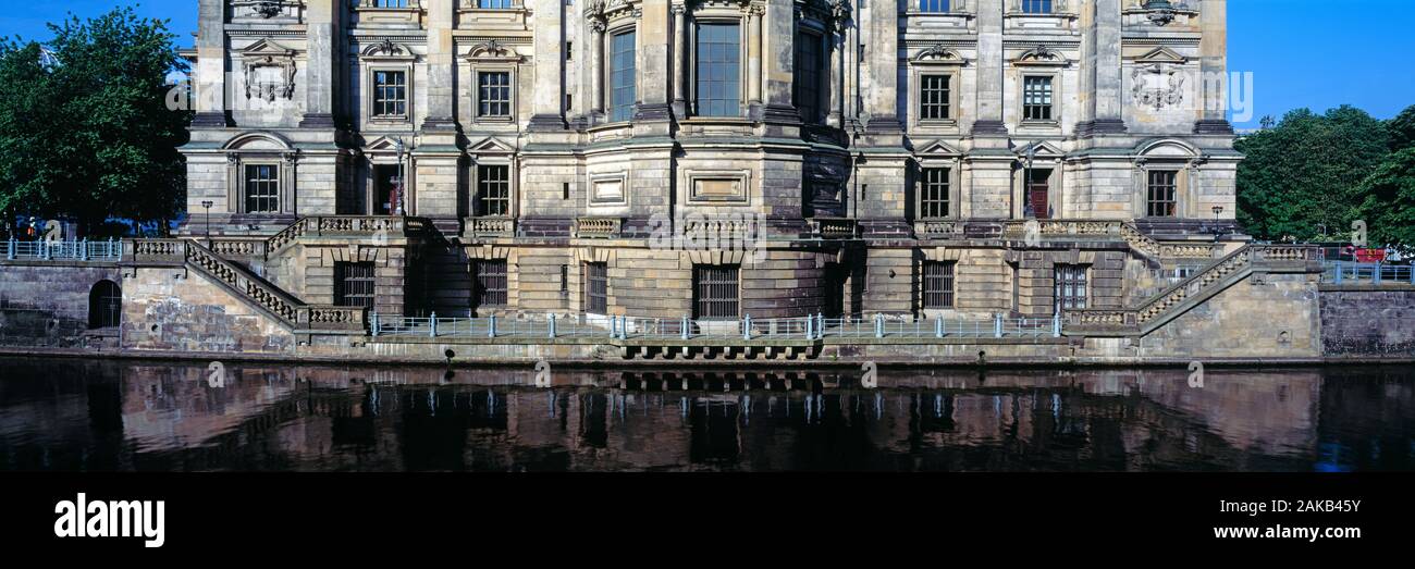 Facade of Berlin Cathedral reflecting in Spree River, Berlin, Germany Stock Photo