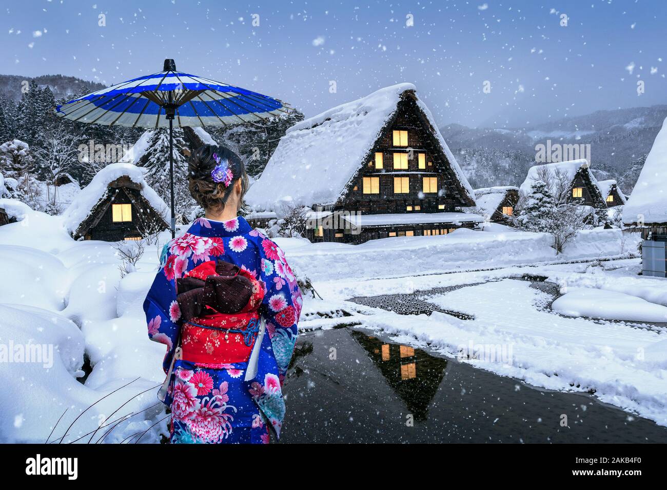 Asian woman wearing japanese traditional kimono at Shirakawa-go