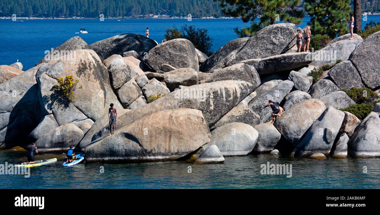 Tourists and paddleboarders at of Lake Tahoe, Sand Harbor, Nevada, USA Stock Photo
