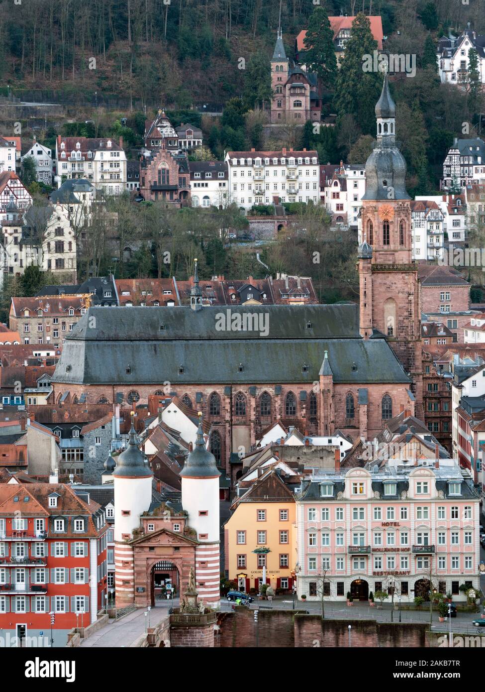 Heidelberg, Germany, bridge gate of Old Bridge and Church of the Holy Spirit Stock Photo