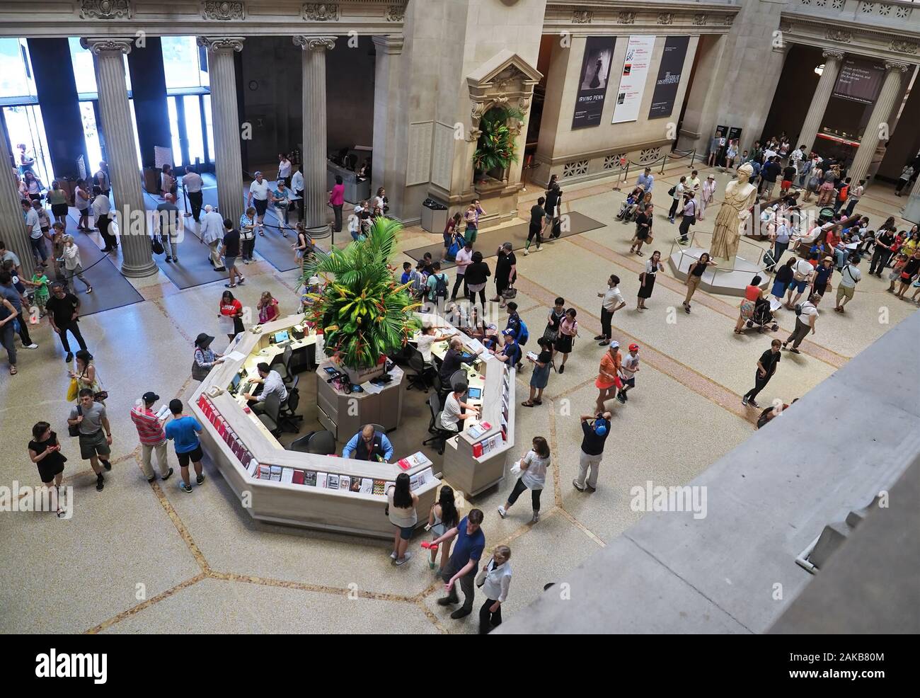 New York City, NY USA. Jul 2017. Second floor view of the lobby, people, and visitor center of the Metropolitan Museum of Art in NYC. Stock Photo
