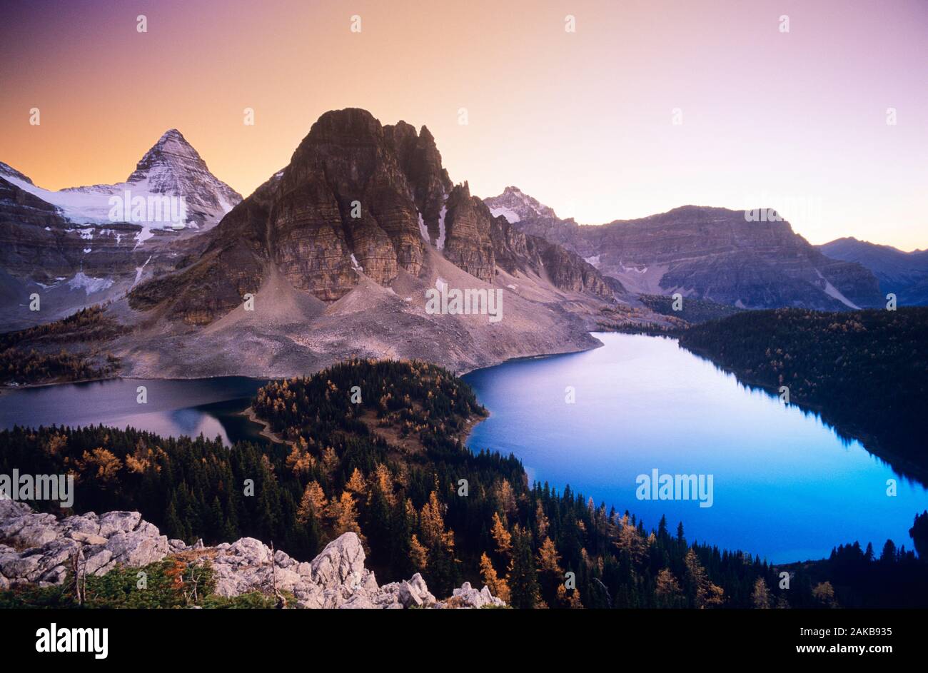 Landscape with Mount Assiniboine and Cerulean Lake at sunset, Mount Assiniboine National Park, British Columbia, Canada Stock Photo