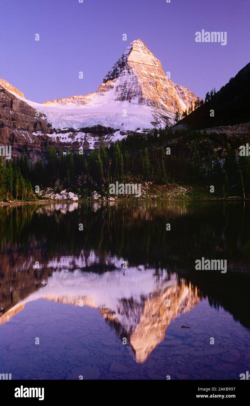 Landscape with Mount Assiniboine reflecting in Sunburst Lake, Mount Assiniboine Provincial Park, British Columbia, Canada Stock Photo