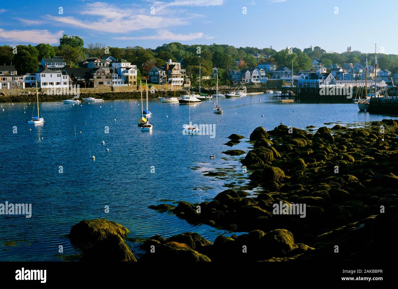 Anchored sailboats and coastal town of Rockport, Massachusetts, USA Stock Photo