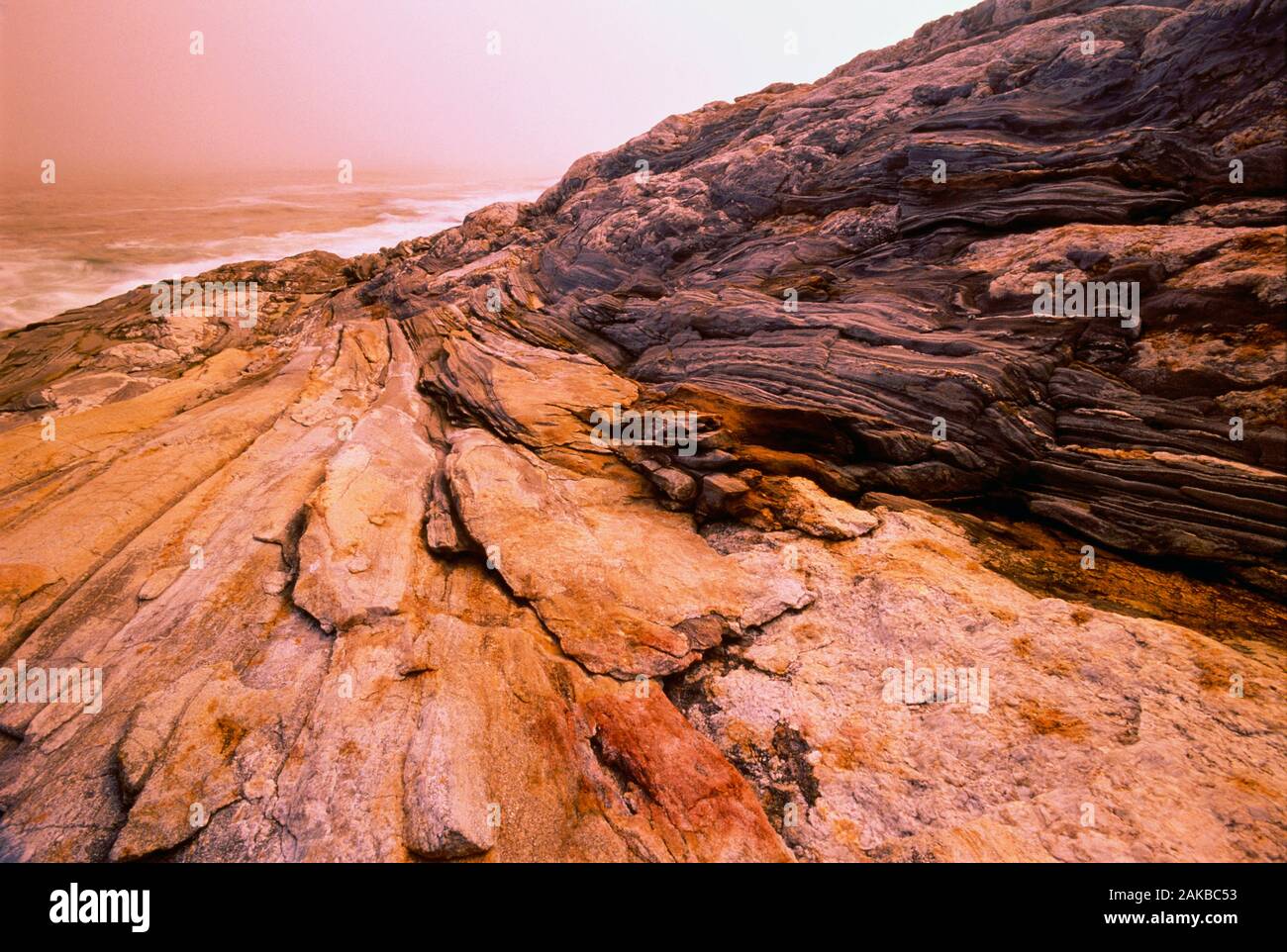 Landscape with view of rocky coastline at sunset, Pemaquid Point, Bristol, Maine, USA Stock Photo