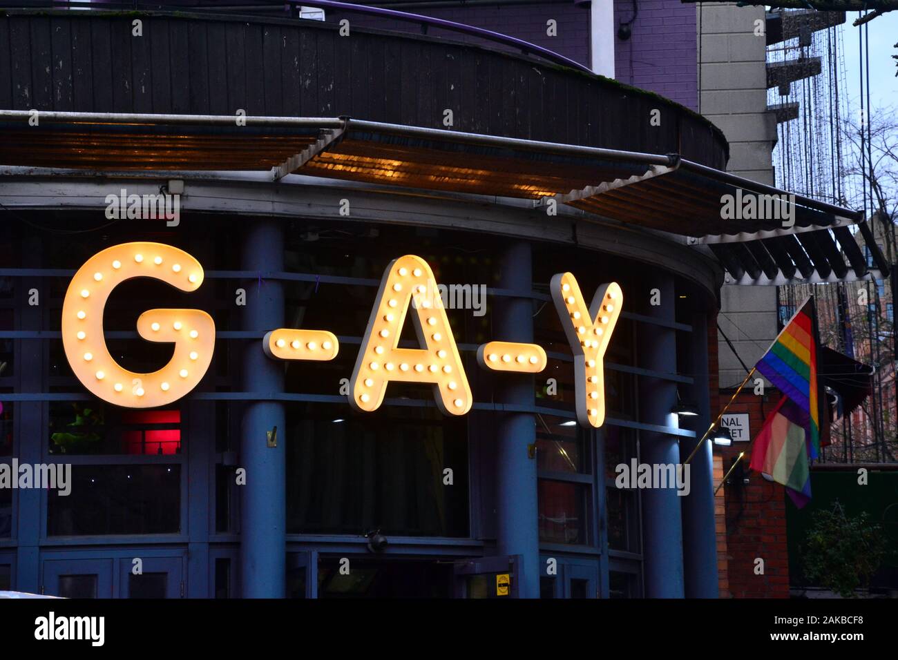 GAY nightclub, Canal Street, in the lesbian and gay village in Manchester, United Kingdom, near where serial rapist, Reynhard Sinaga, lived for 5 years, and picked up his victims, pretending to help them.  On January 6, 2020, a judge jailed Sinaga for life, specifying he should serve a minimum term of 30 years. He drugged his young, male victims and filmed himself raping them. Sinaga, aged 36, an Indonesian PhD student, was found guilty of 159 sexual offences against 48 men. The media report that the police believe he may have abused as many as 195 men. Stock Photo