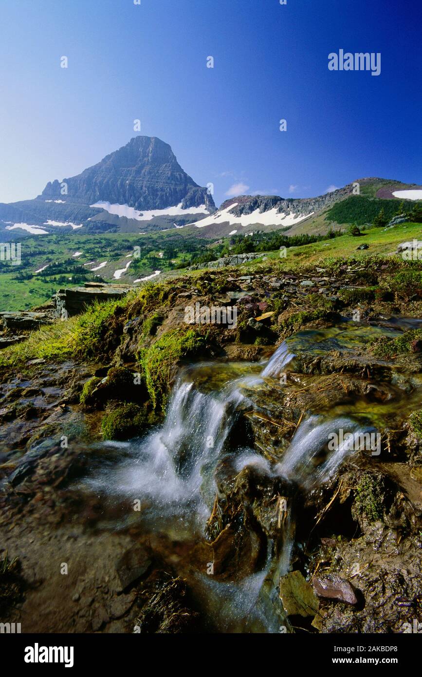 Landscape with mountain peak and stream, Glacier National Park, Montana, USA Stock Photo