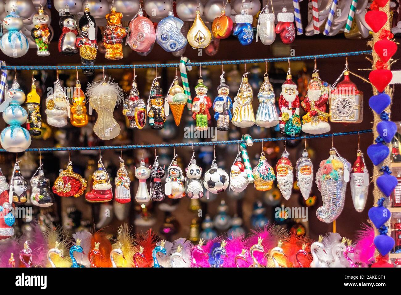 Christmas tree ornaments on display at Christmas market in winter wonderland of London Stock Photo