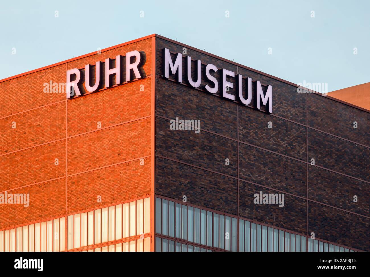 Essen, Ruhr Area, North Rhine-Westphalia, Germany - Ruhr Museum at Zeche Zollverein, UNESCO World Heritage Zollverein, illuminated lettering on the fa Stock Photo