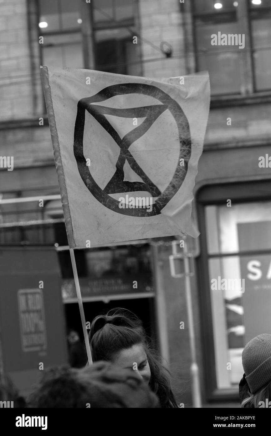 Flag From The Rebellion Extinction Group At The Demonstration On The Dam At 6-1-2020 Amsterdam The Netherlands 2020 In Black And White Stock Photo