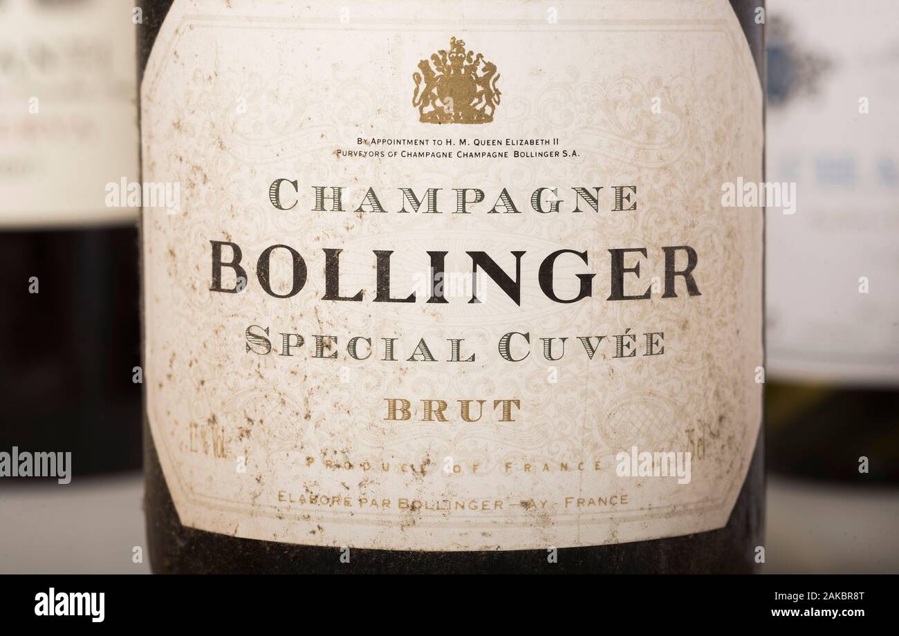 A close up of the label on a bottle of Bollinger Champagne. Royal Warrant that'll be removed following Queen's death. Stock Photo