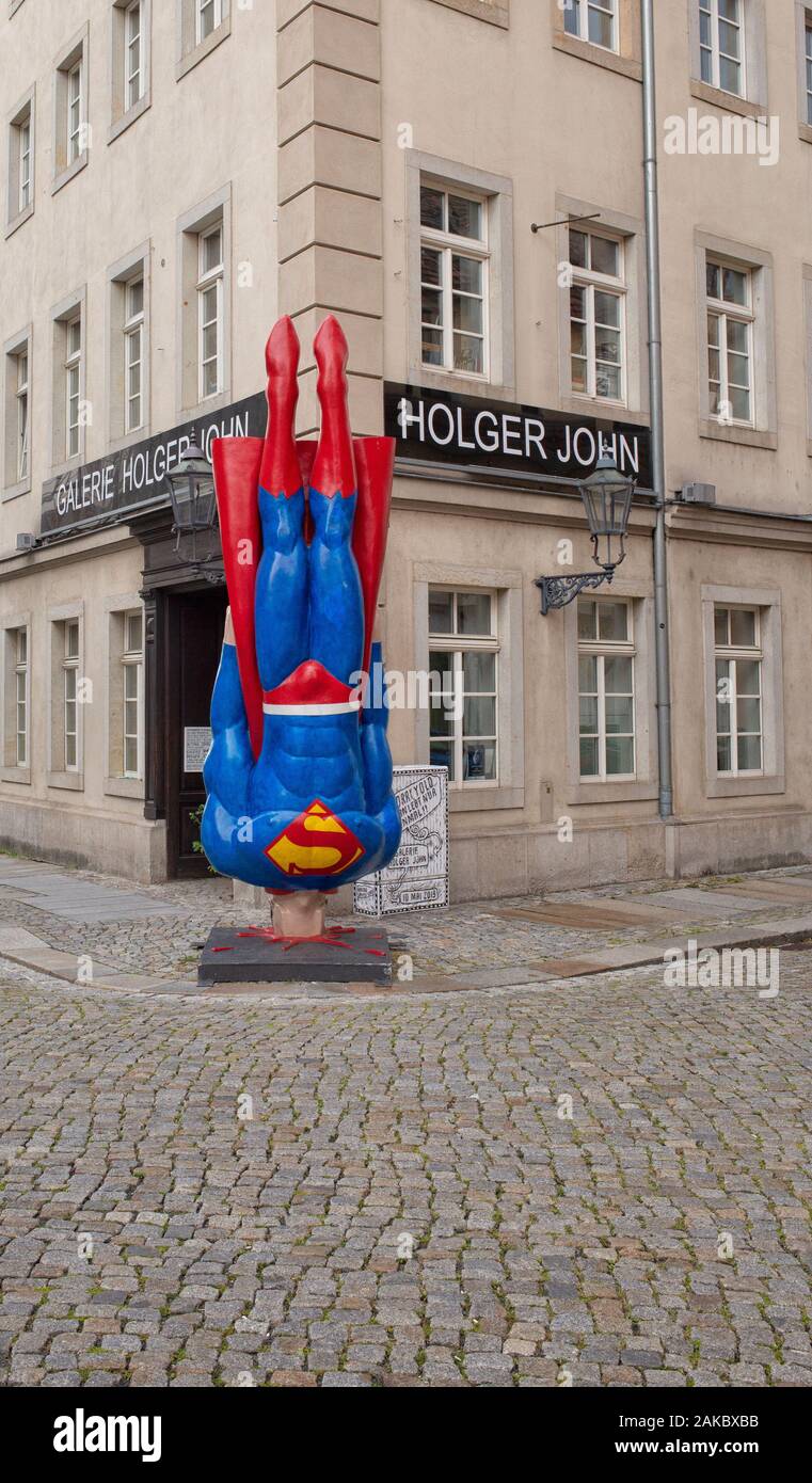 The sculpture 'Auch Helden haben schlechte Tage!' (Heroes have their bad days also)  by Marcus Witwers from Berlin. Stock Photo