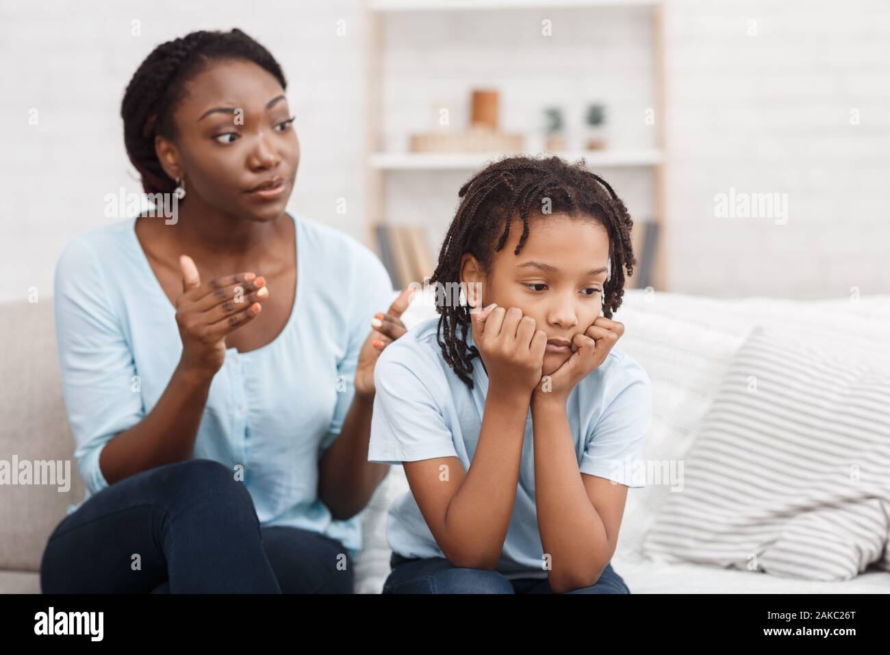 Family Conflict. Quarrel between black mother and daughter at home ...