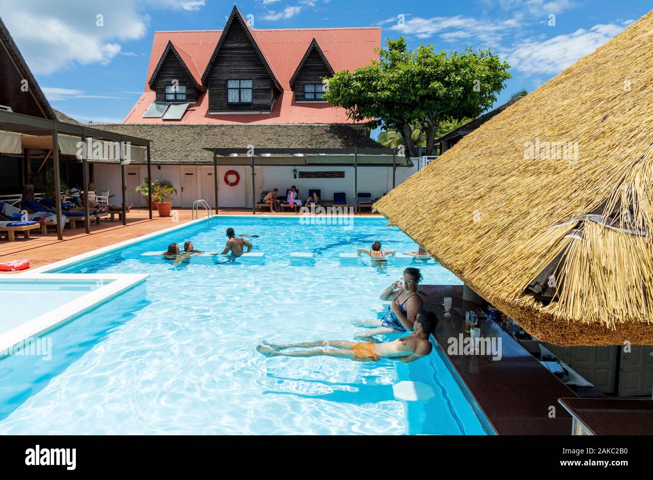 Seychelles, La Digue Island, sunbathers at La Digue Lodge pool bar Stock Photo