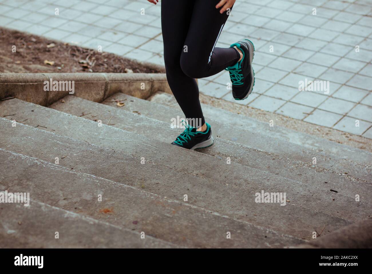 Woman climbing stairs hires stock photography and images Alamy