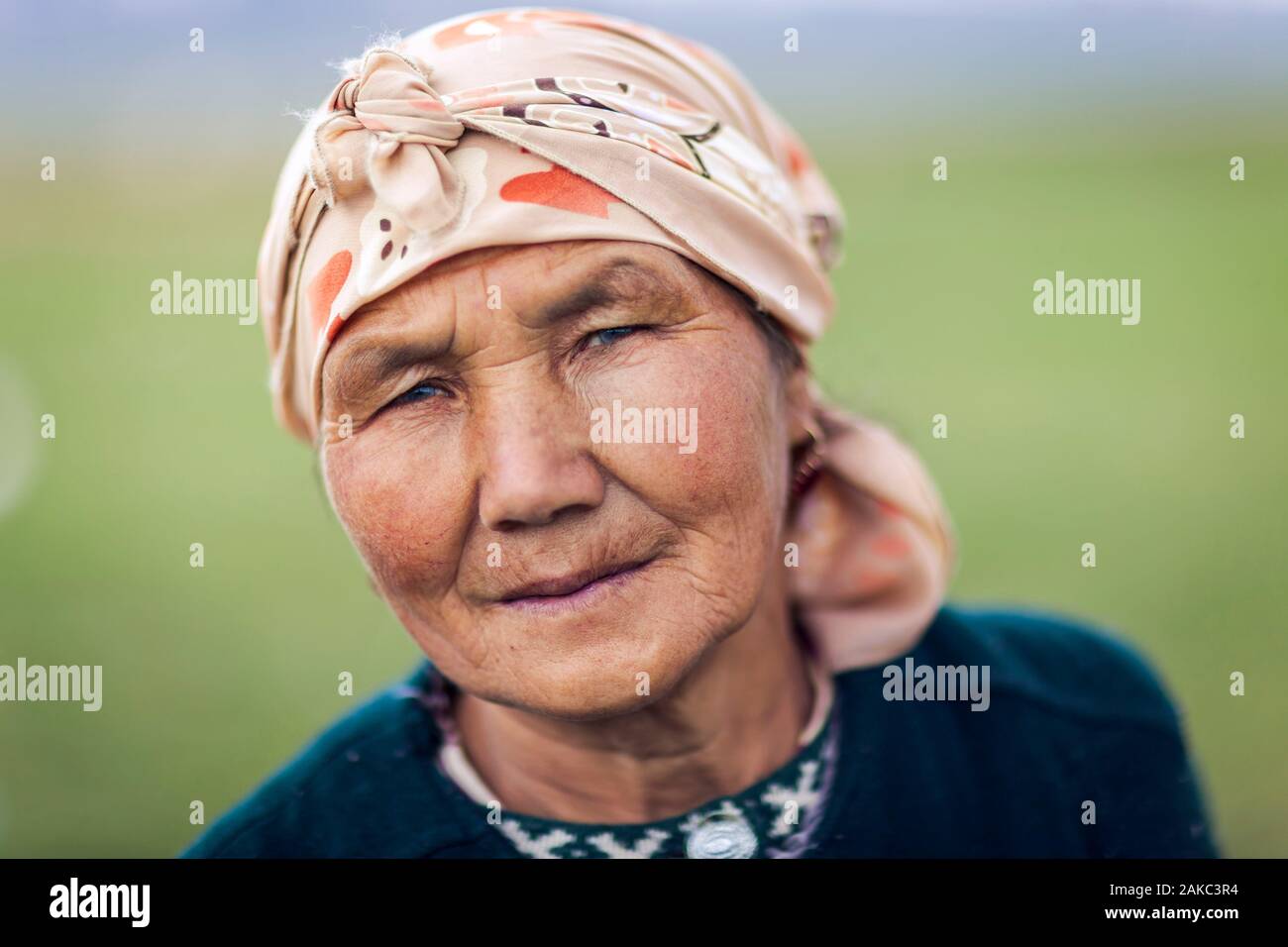Kyrgyzstan, Naryn Province, Son-Kol Lake, altitude 3000m, portrait of a Kyrgyz woman wearing a headscarf Stock Photo