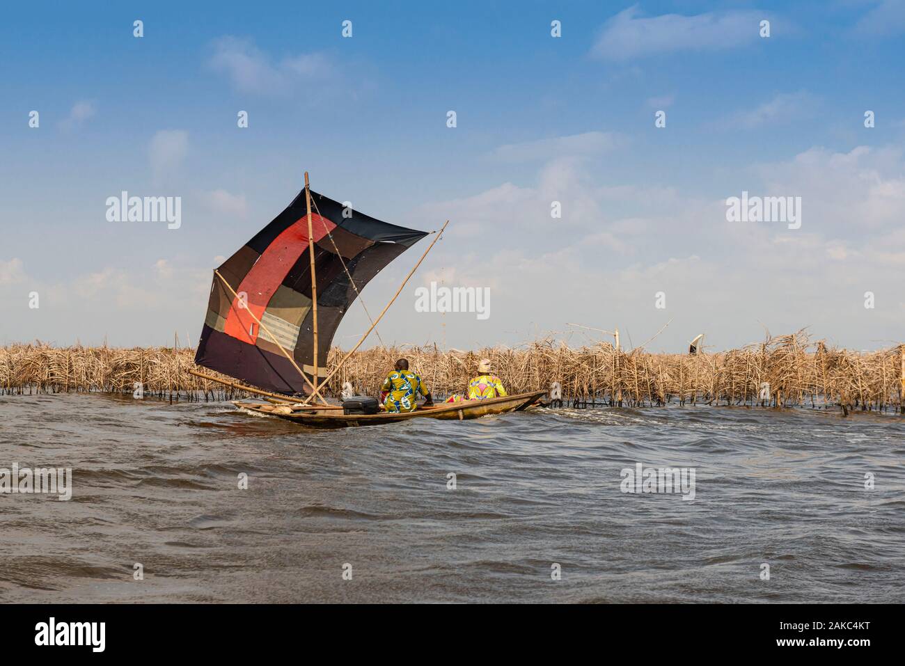 Benin, lakeside city of Ganvié, inhabitants on dugout Stock Photo