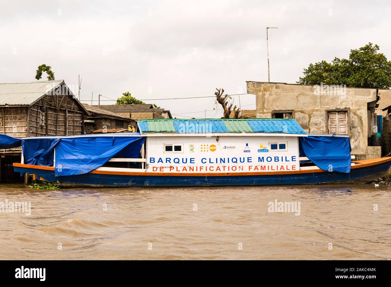 Benin, lakeside city of Ganvié, family planning boat Stock Photo