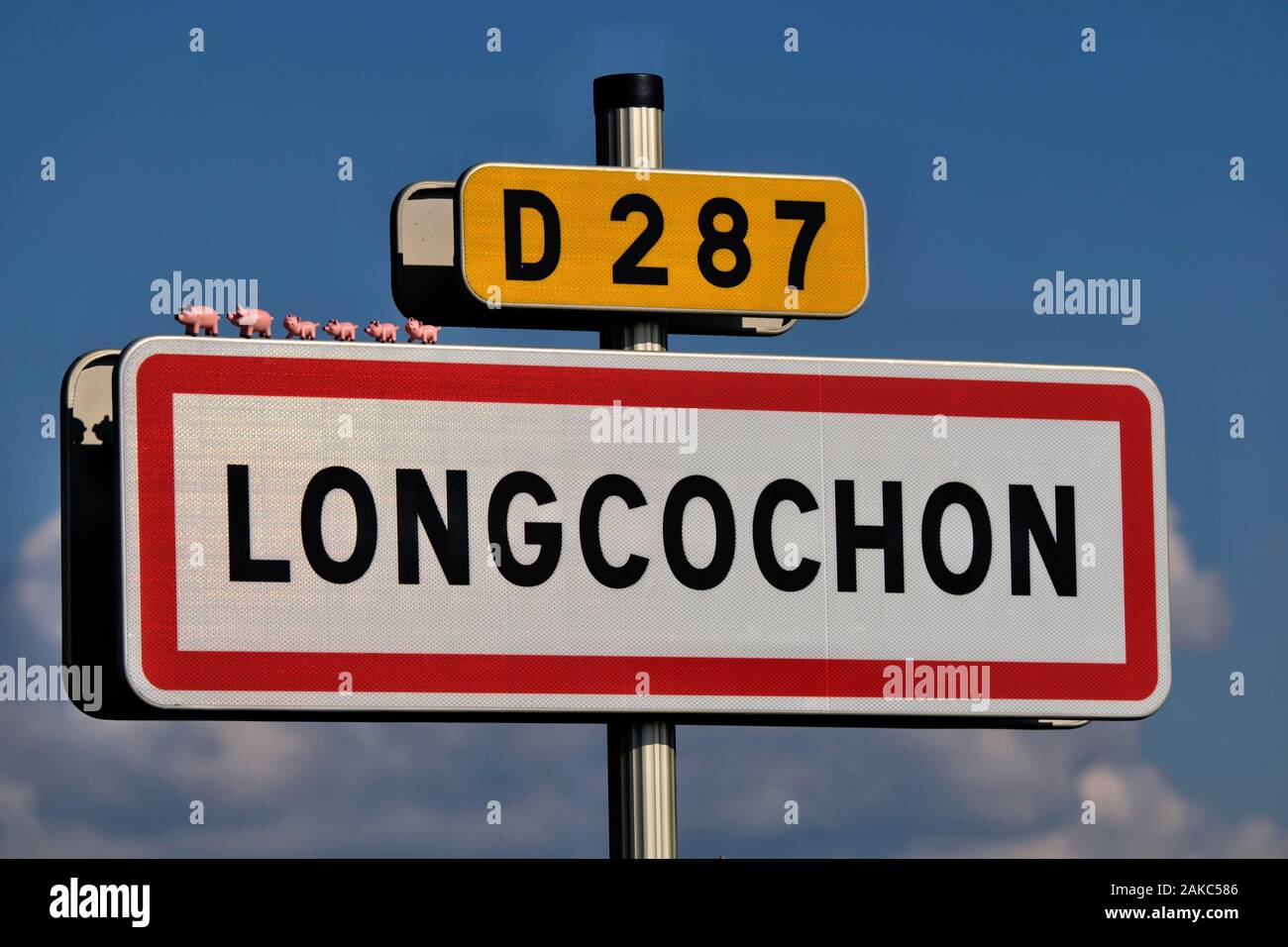 France, Jura, Longcochon, village entrance sign, pigs, toys Stock Photo -  Alamy