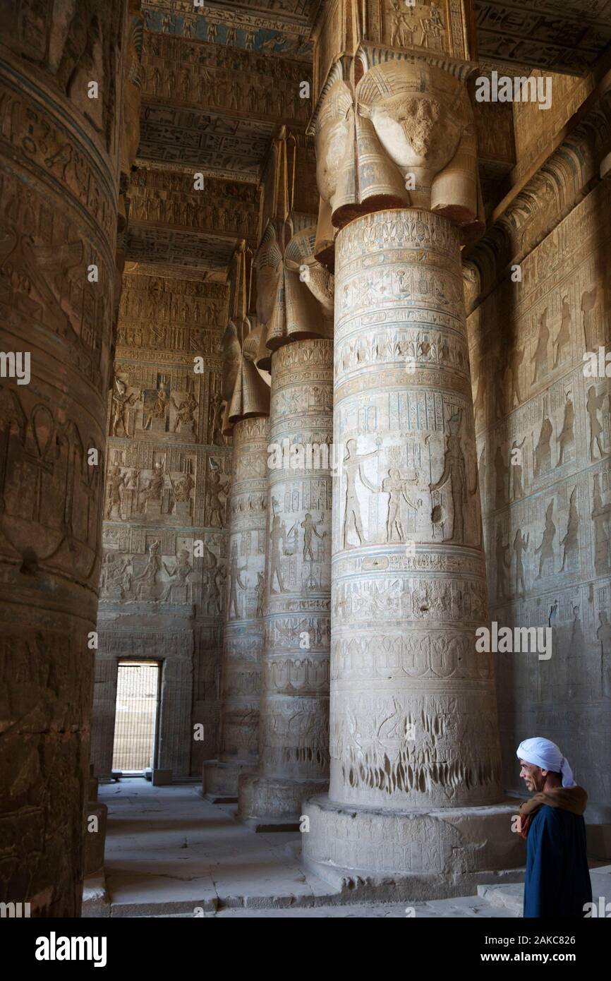 Egypt, Upper Egypt, Nile Valley, Dendera, guardian of the temple in front of the columns of the hypostyle hall of the temple of Hathor Stock Photo