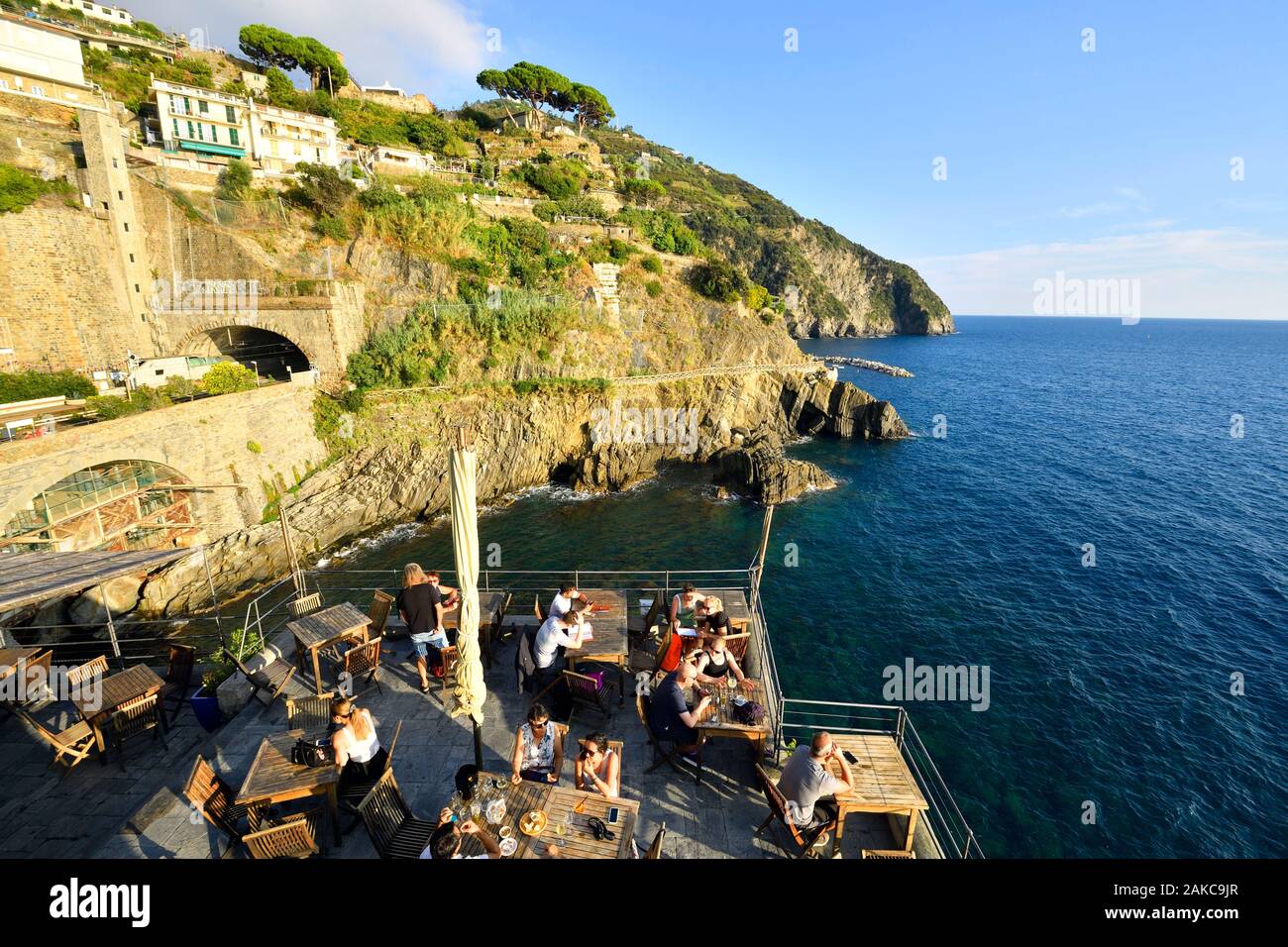 Italy, Liguria, La Spezia province, Cinque Terre National Park, listed as  World Heritage by UNESCO, Riomaggiore village, A pie de Ma bar Stock Photo  - Alamy