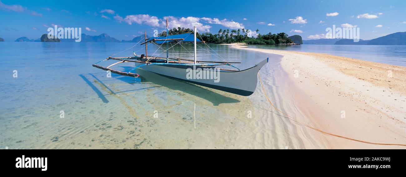Fishing boat moored on the beach, Palawan, Philippines Stock Photo