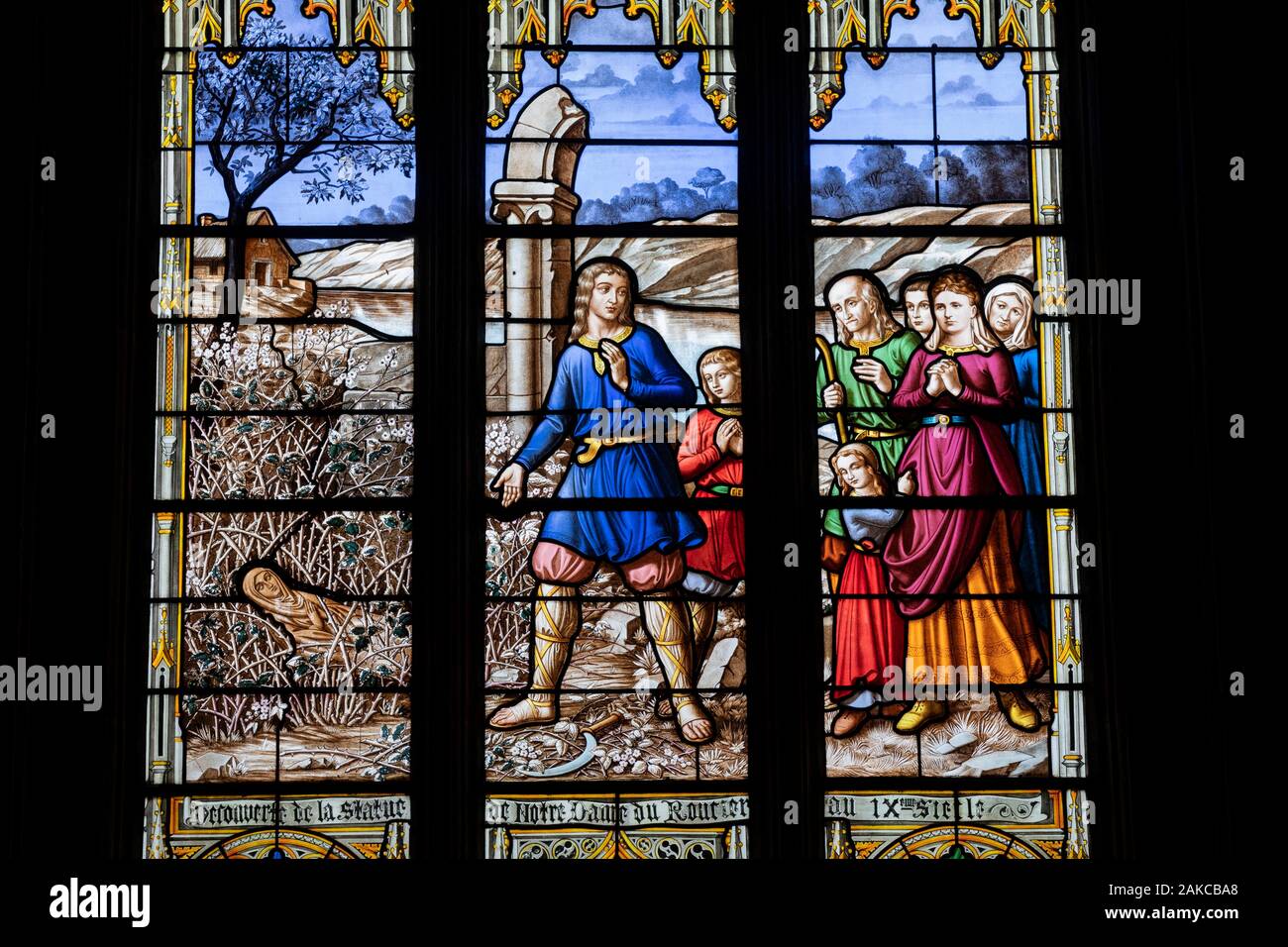 France, Morbihan, Josselin, medieval village, basilica Notre Dame du Roncier, stained glass, discovery of the statue of Our Lady of the Roncier in the 9th century, Carmel workshop of Le Mans, Ferdinand Hucher, 1893 Stock Photo