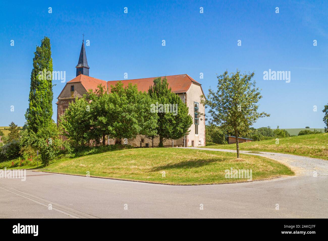 Full view of the Monastery church Lobenfeld, an old church building in Baden-Württemberg, Germany in summer sunshine Stock Photo