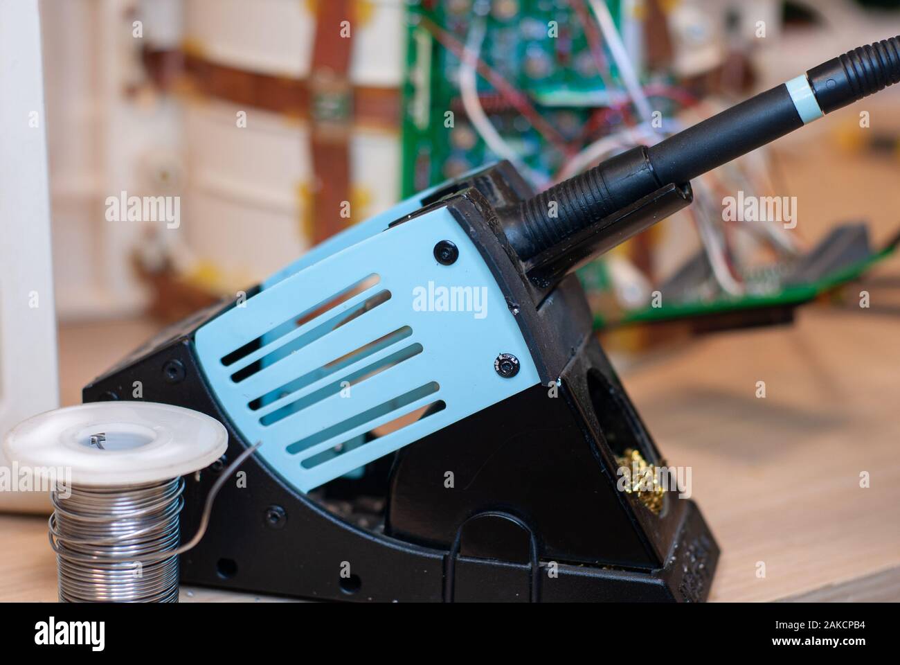 Soldering iron and tin coil, useful electronic laboratory instrument Stock Photo