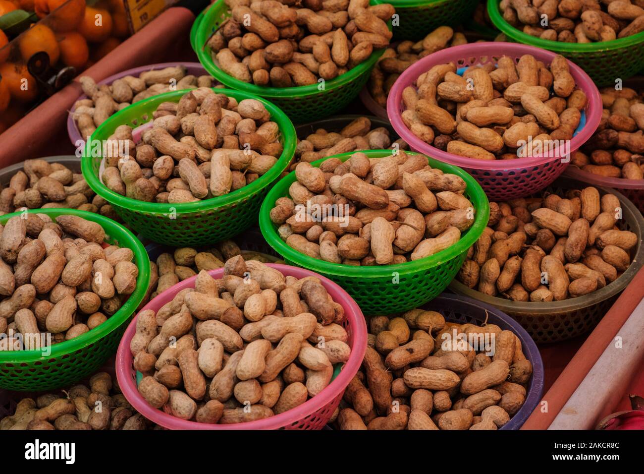 peanuts for sale on market peanut pile Stock Photo Alamy