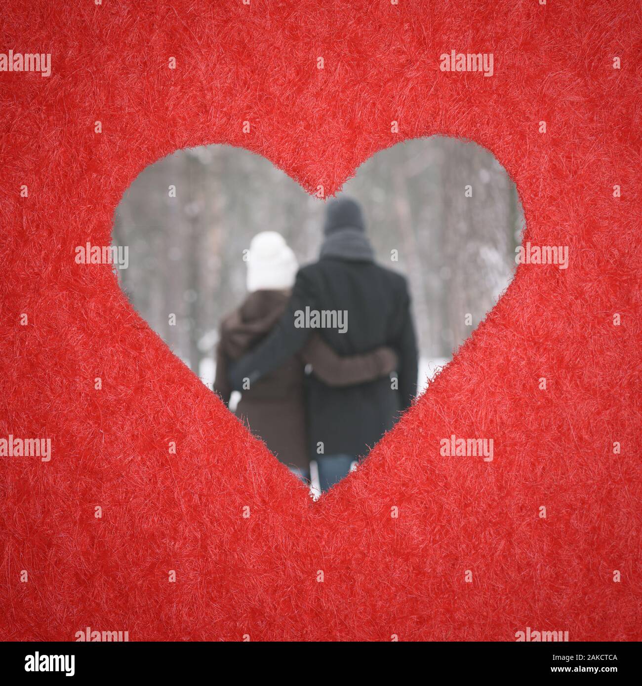 Hole in shape of heart. Plot is Valentines Day. A loving couple ...