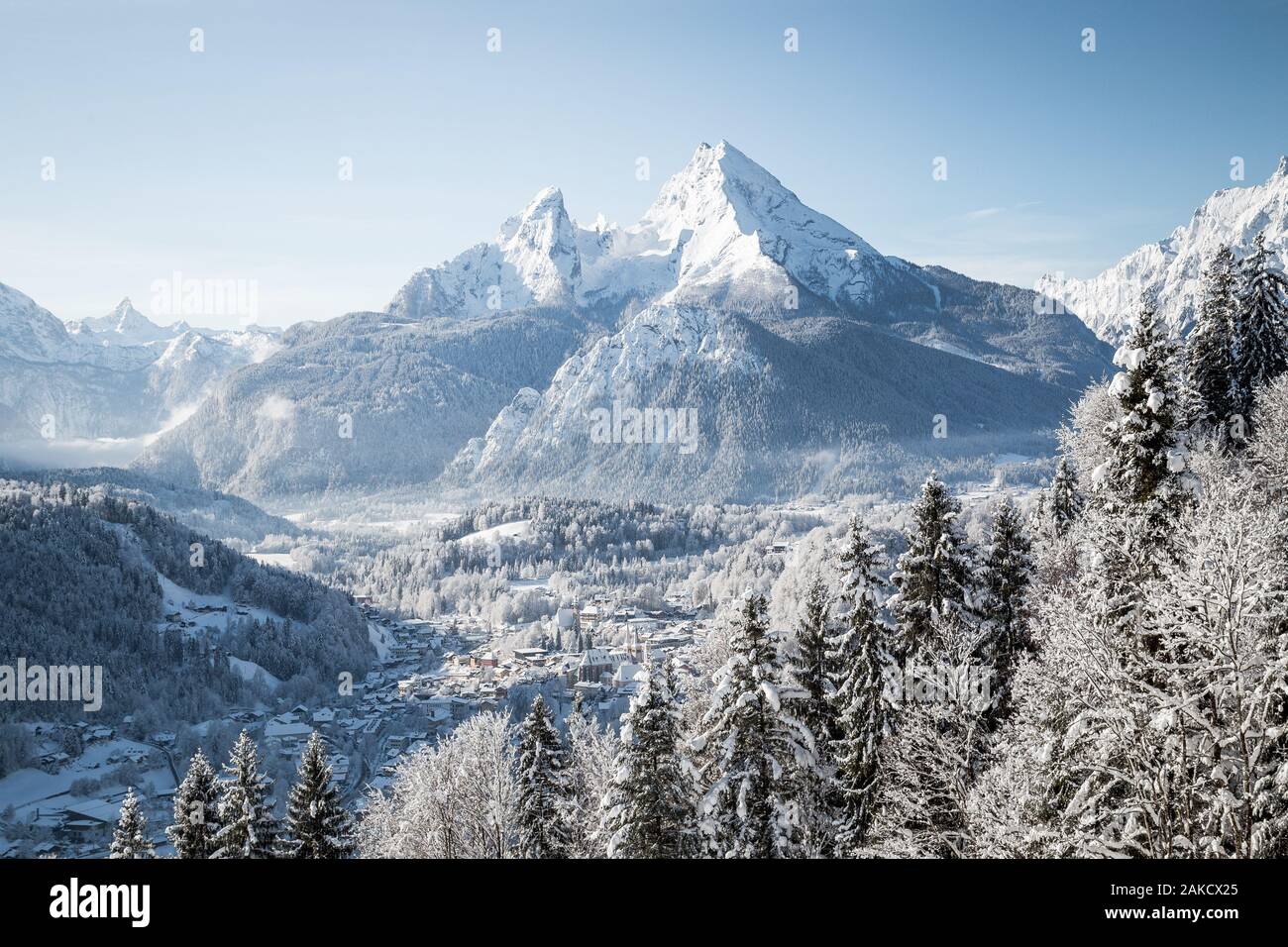Beautiful mountain landscape in the Bavarian Alps with village of Berchtesgaden and Watzmann massif in the background at sunrise, Nationalpark Berchte Stock Photo
