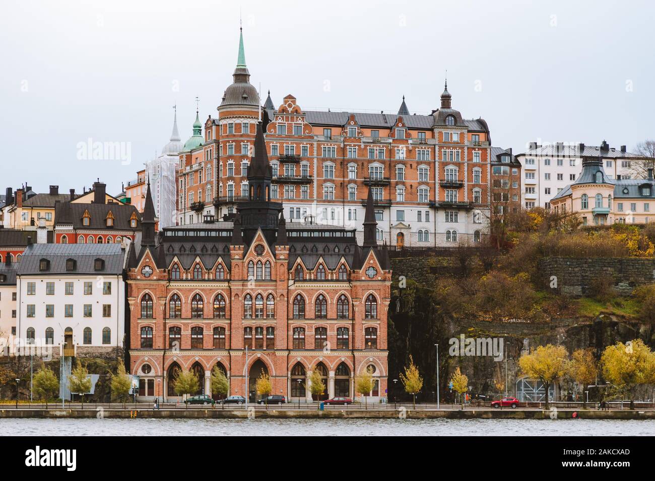 Stockholm waterfront view towards Sodermalm district with historic Mariahissen building and Monteliusvagen on a moody fall day, Sweden, Scandinavia Stock Photo