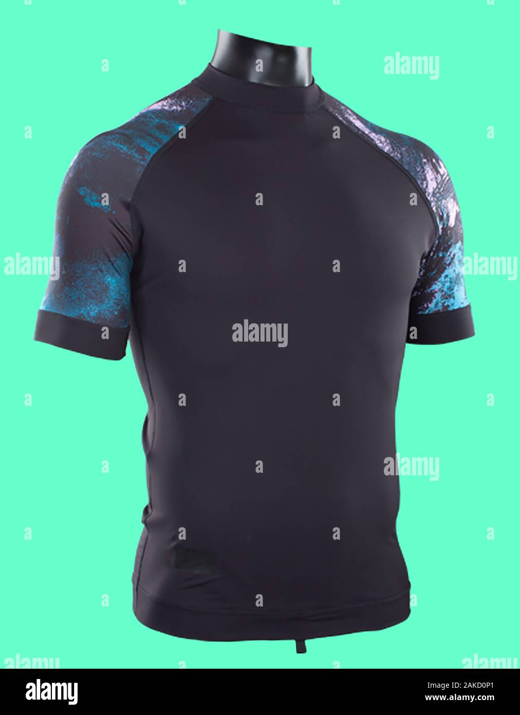 Short sleeved capsule color Rash guard for men on cyan background ,Front view Stock Photo