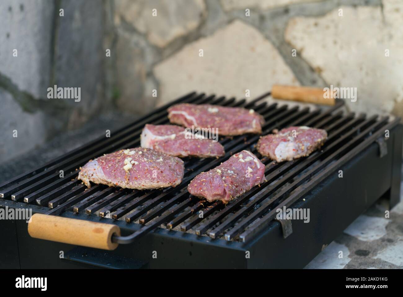 beef steak on the grill, close up Stock Photo Alamy