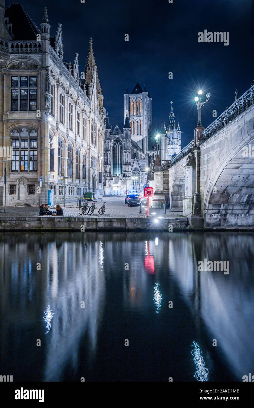 Panoramic view of the historic city center of Ghent illuminated in beautiful post sunset twilight during blue hour at dusk, Ghent, East Flanders, Belg Stock Photo