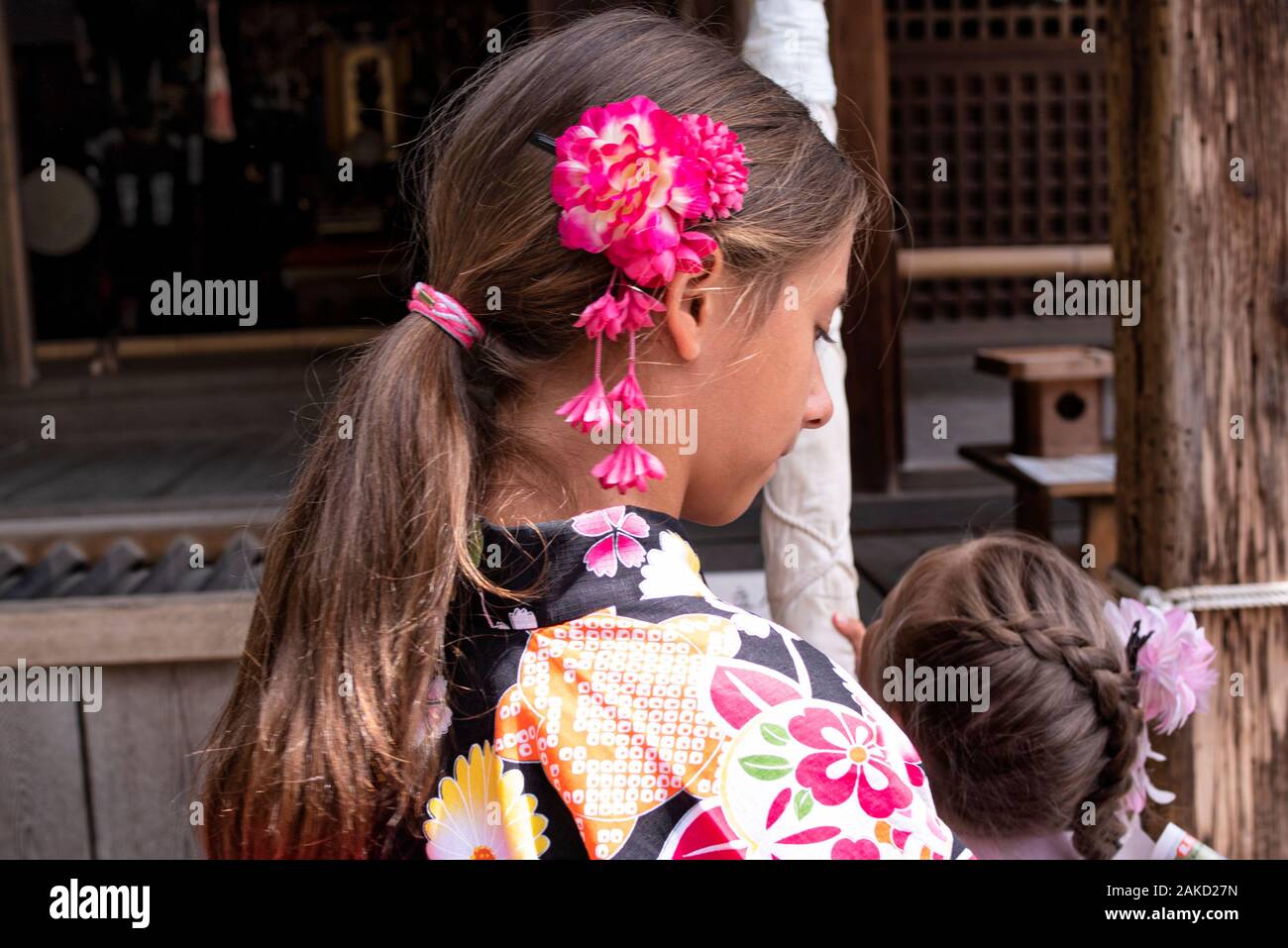 European girl in kimano clothes at a Japanese restaurant in Japan in